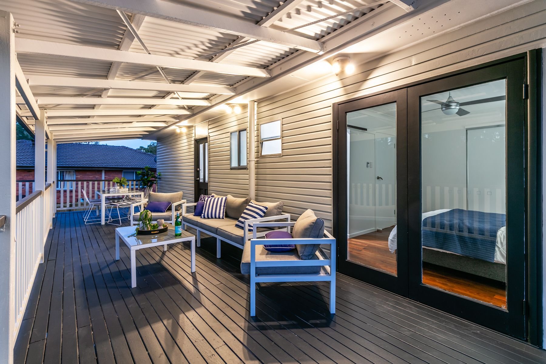 Large covered rear deck upstairs, Woodridge renovation